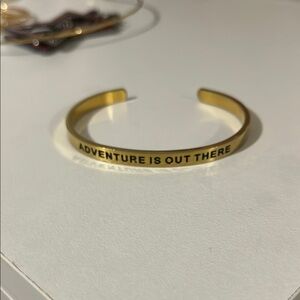 Gold cuff Adventure is out there from Disney Pixar’s Up Bracelet